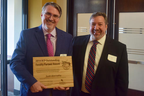 Scott Abernathy with Mike Greco and the 2019 Outstanding Faculty Partner- Ramsey County Award