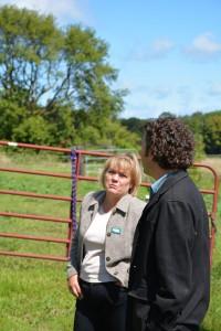 Professor Todd Grover and Carver County Historical Society Director Wendy Petersen-Biorn tour the Andrew Peterson Farm. Photo courtesy of Mike Greco.