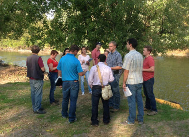 Civil engineering students meeting with Tim Sundby, water quality technician for Carver County. Photo: CURA